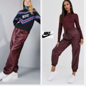 Nike red and black python print woven jogger pants size medium